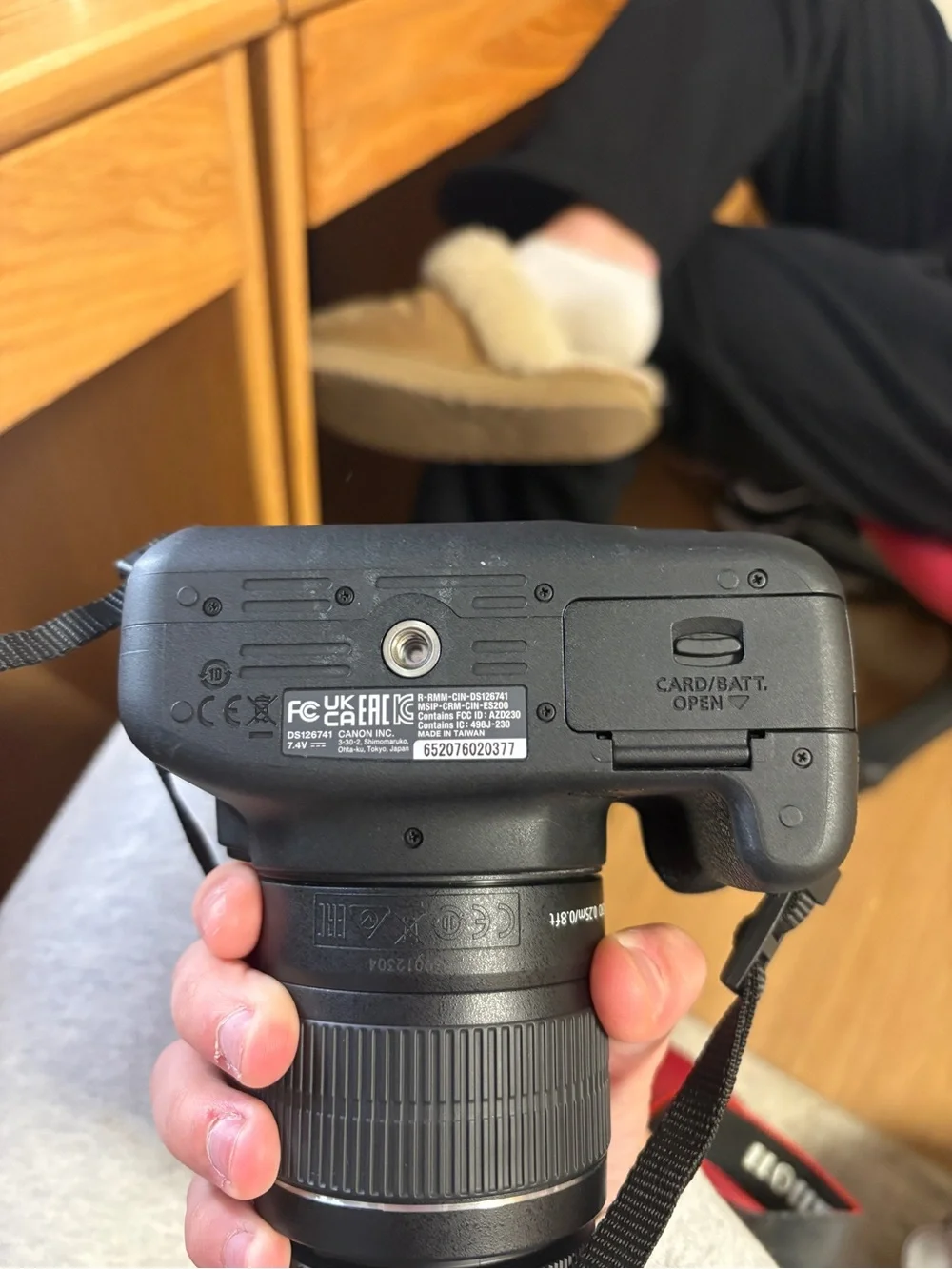 Canon DSLR Camera with Black Body and Black 18-55mm Lens